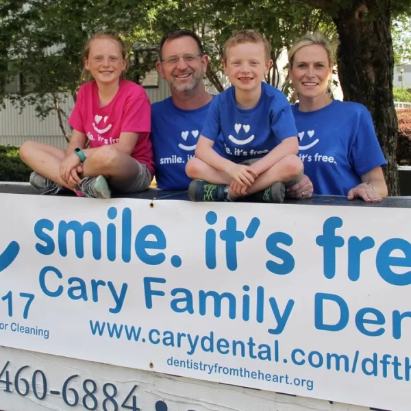 DFTH-sign-with-Acton-family-web.jpg