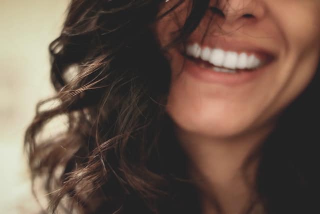 Woman with nice teeth smiling with confidence